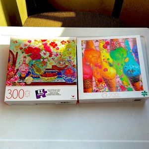 2  300 piece puzzles.